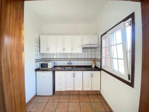 Η κουζίνα ή μικρή κουζίνα στο Casa Simon -Villa Colón