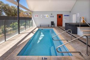 a large swimming pool in a building at 68CapeView Geographe bay in Busselton