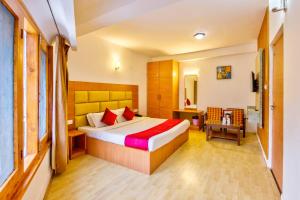 Letto o letti in una camera di Hotel Greenfields