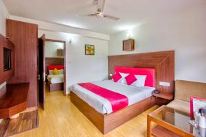 Letto o letti in una camera di Hotel Greenfields