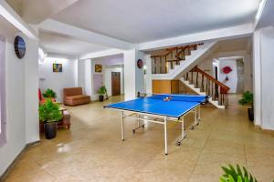 Stolní tenis v ubytování Hotel Greenfields nebo okolí