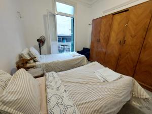 Postel nebo postele na pokoji v ubytování Ahllan Hostel For Men onlyغرف خاصة للرجال فقط 仅限男士 女士不允许 + 26 fotografií