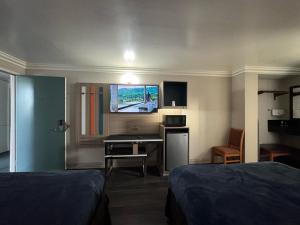 Sjónvarps- og/eða afþreyingartæki á Rodeway Inn