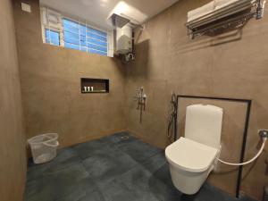 Vannituba majutusasutuses Ibex Resorts, Coimbatore Kakarla