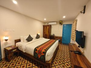 Voodi või voodid majutusasutuse Ibex Resorts, Coimbatore Kakarla toas