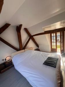 Katil atau katil-katil dalam bilik di Golf Hotel de la Carte +58 gambar