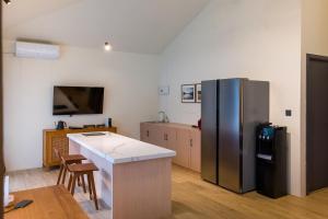 Kuchyň nebo kuchyňský kout v ubytování Eden Villa