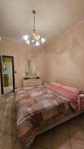 Ένα ή περισσότερα κρεβάτια σε δωμάτιο στο Casa Rosa