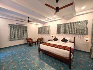 Voodi või voodid majutusasutuse Ibex Resorts, Coimbatore Kakarla toas