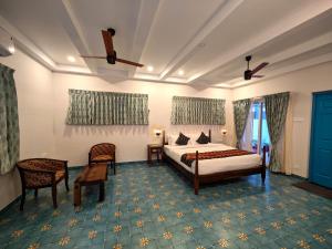 Voodi või voodid majutusasutuse Ibex Resorts, Coimbatore Kakarla toas