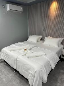 Postel nebo postele na pokoji v ubytování Jazz guest house