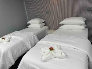 Postel nebo postele na pokoji v ubytování Jazz guest house