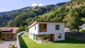a house on the side of a mountain at Chalet Samont in Laion