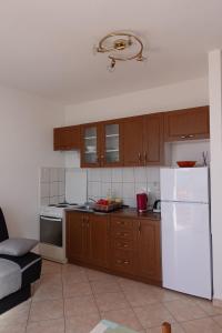 Kuchyň nebo kuchyňský kout v ubytování Apartman Ana