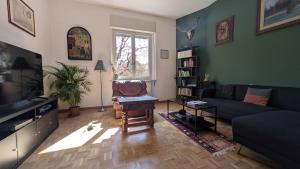 TV a/nebo společenská místnost v ubytování Casa Flamingo