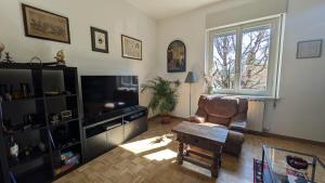 TV a/nebo společenská místnost v ubytování Casa Flamingo