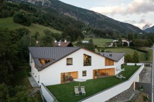an aerial view of a house in the mountains at Chalet Samont in Laion +83 photos