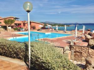 Gallery image of Residence with swimming pool in Marinella just 300 mt from the sea, apartments with sea view in Marinella +14 photos