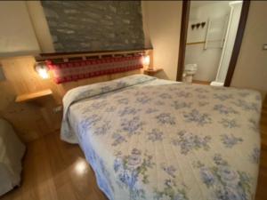 Postel nebo postele na pokoji v ubytování Chambres D'hôtes Maribel