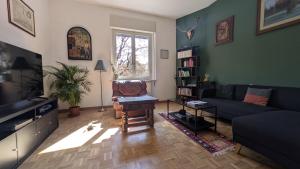 TV a/nebo společenská místnost v ubytování Casa Flamingo