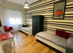 Letto o letti in una camera di Torre Maura Apartment