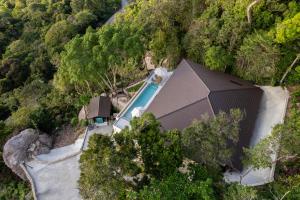an overhead view of a house in a forest at Amor Kohtao in Ko Tao