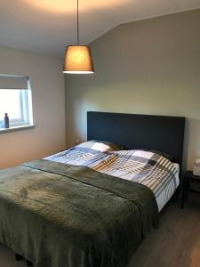 Postelja oz. postelje v sobi nastanitve vakantiewoning Gulp bij Het Plateau Heijenrath