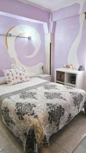 Posteľ alebo postele v izbe v ubytovaní Hostal La Rosa