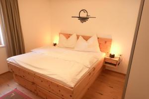 Postel nebo postele na pokoji v ubytování Ferienwohnung Wallner