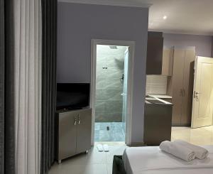 Koupelna v ubytování Hotel Erta + 37 fotografií