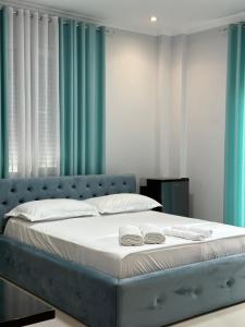 Postel nebo postele na pokoji v ubytování Hotel Erta
