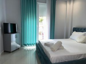 Postel nebo postele na pokoji v ubytování Hotel Erta
