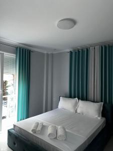 Postel nebo postele na pokoji v ubytování Hotel Erta