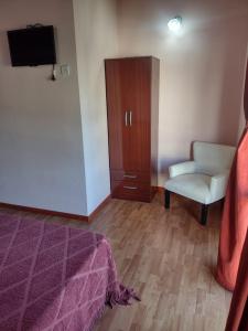 TV a/nebo společenská místnost v ubytování Bungalows IVARAB