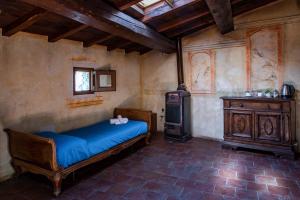 Postel nebo postele na pokoji v ubytování Albergo Diffuso - Rocca Calascio