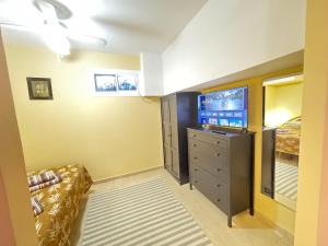 TV a/nebo společenská místnost v ubytování ADA & Gran Alacant & Vacation