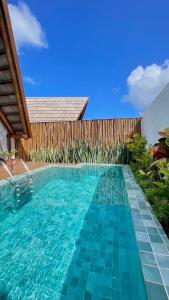 Pousada Villa di Luna内部或周边的泳池