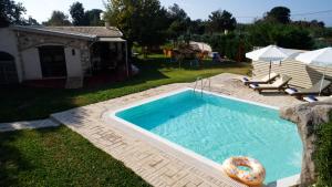 The swimming pool at or close to Stalakton Country Maisonettes