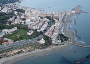 an aerial view of a city next to the ocean at il posto giusto - the right place in Anzio