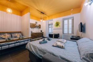 Ένα ή περισσότερα κρεβάτια σε δωμάτιο στο Doors Valletta