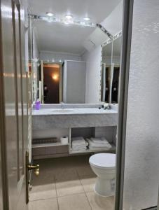 Koupelna v ubytování Apart Hotel Casablanca + 35 fotografií