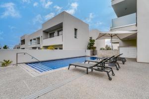 an image of a house with a swimming pool at Anchora in Paralimni
