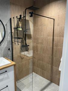 Ένα μπάνιο στο Apartament z widokiem na morze Aqua & Premium - Perłowa Przystań