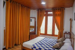 Postel nebo postele na pokoji v ubytování Tedro home stay