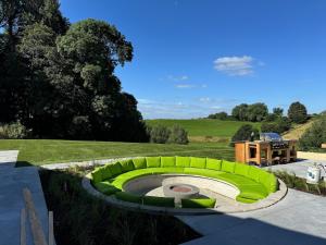 a green circle in the middle of a yard at Vakantiewoning The View in Gooik