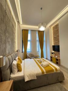 Postel nebo postele na pokoji v ubytování House4You - Blanari