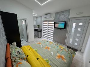 Voodi või voodid majutusasutuse Mitić Apartmani 1 toas