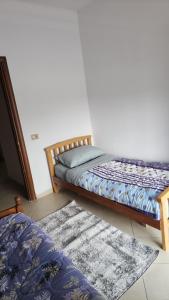 Postel nebo postele na pokoji v ubytování A-Tirana Apartment Bus Terminal