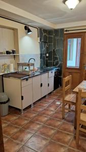 Kuchyň nebo kuchyňský kout v ubytování Entre Mar y Montaña