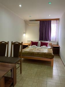 Katil atau katil-katil dalam bilik di Motel BM +13 gambar